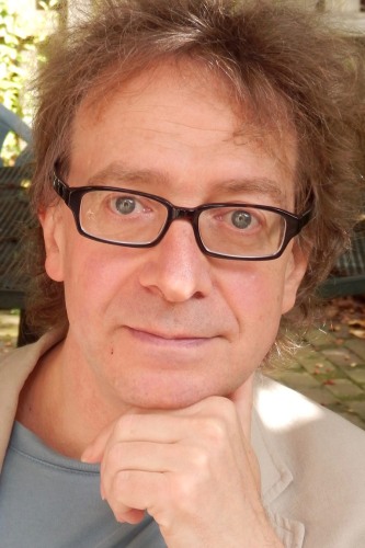 Headshot of Director, Andrew Laird.